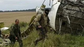 MH17 crash scene: Volunteers look for remains