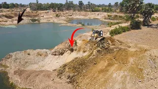 New Bulldozer D60p pushing soil into lake Extremely amazing action