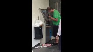 Drunk man drops beer at ATM and gets sprayed