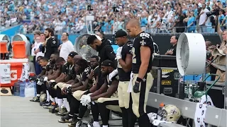 NFL players kneel during National Anthem in protest of Trump's comments