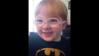 Adorable baby’s reaction to her first glasses and seeing her parents clearly!