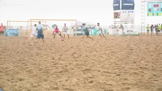 Rainy weather isn't stopping the world's largest beach soccer tournament in Virginia Beach