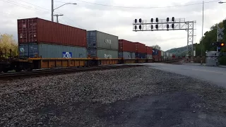 Impatient dumptruck driver goes around gates before WB S train comes.