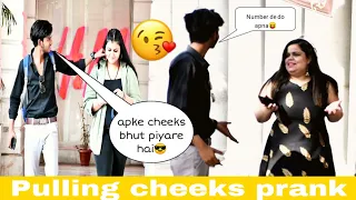 Pulling cheeks prank [part-2] #pulling #cheeks #strangers #prank #haryana #delhi #india