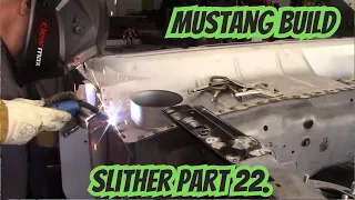 Welding in firewall, frame rails and lower cowl in a classic mustang. Slither part 22.