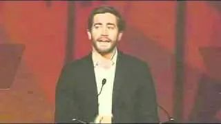 Jake Gyllenhaal presenting an award to Natalie Portman