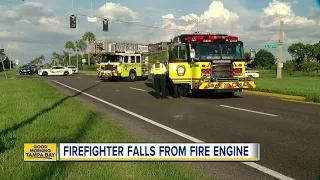 Firefighter hospitalized after falling off truck