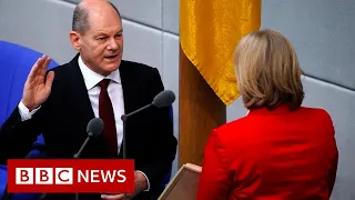 Germany's Olaf Scholz takes over from Merkel as chancellor - BBC News