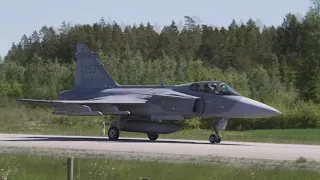 Swedish Air Force JAS 39 'Gripen Fighters' Land on a Highway