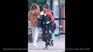 Helena Bonham Carter Wears what looks like a doyly around her neck & two pairs of specs on her head.