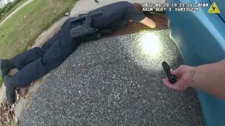 Police Officers Rescue Cat Stuck in Storm Drain