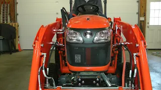 Kubota B2601 with LA435 Loader and BX2448 SSQA Bucket. Loader mounting to tractor.