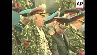 Putin and Ukranian president attend military parade