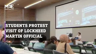 Students at the University of Texas Dallas protest the visit of a Lockheed Martin Senior Fellow