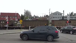 (Northbound) BNSF Coal Train passes through the McCarver Street Railroad Crossing.