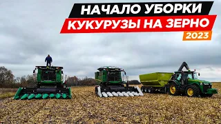 Два комбайна John Deere, один бункер-перегрузчик Fliegl и четыре Камаза на уборке кукурузы.