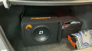 Установка активного сабвуфера DL Audio  Piranha 12A Black в автомобиль Nissan Sentra b17