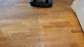 Removing heavy wax build-up from hardwood floors and applying new refinisher