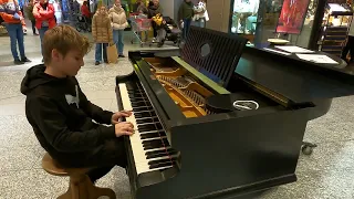 Playing famous songs on piano in public