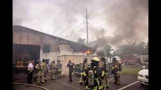 Jacksonville Fire Rescue Department  responds to school bus depot structure fire