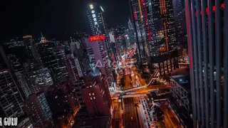 Bright lights from the city at night aerial by Timelab Pro Hd