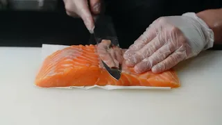 stock videos footage cutting salmon-fillet fish - Free video