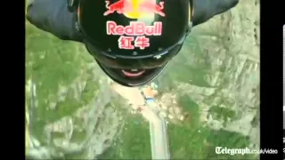 Amazing wingsuit stuntman Jeb Corliss  soars through China mountains