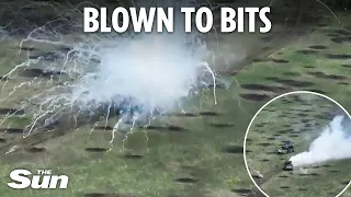 Moment two Russian armoured vehicles are obliterated by Ukraine before troops flee huge explosion