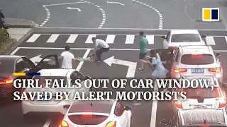 Girl falls out of car window, saved by alert motorists in China