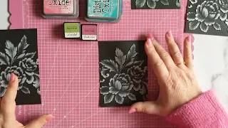 Embossing on black cardstock AND adding colour!