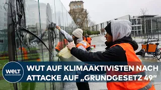 SCHARFE KRITIK AN KLIMAAKTIVISTEN: Letzte Generation beschmiert Grundgesetz-Kunstwerk in Berlin