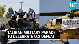 Taliban display military hardware, symbolism to celebrate victory