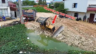 incredibly Teamwork Amazing Dump Truck Helping Bulldozer Komatsu D20A trapped in the water
