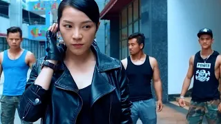 Kung Fu Movie: Thugs harass a woman, unaware she's a kung fu expert who effortlessly beats them up.