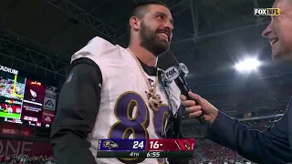 Mark Andrews shows off his chain from Lamar Jackson