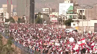 LIVE: Protesters march to central Beirut one year after deadly port blast