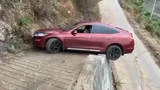 The driving expert demonstrates the very narrow road U-turn skills