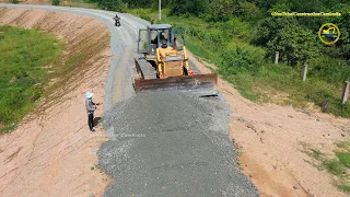 Zoomlion Bulldozer pushing gravel stone & Truck dumped stones on the old road