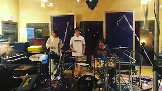 ONE OK ROCK - Tomoya, Toru, and Ryota playing drums