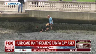 Reverse Surge Leaves Girl Stuck In Mud In Tampa As Hurricane Ian Moves Closer