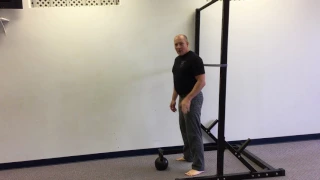 A drill to prevent leaning back in the kettlebell swing