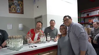 Aaron Paul and Bryan Cranston meet fans of their Los Hombres tequila in Las Vegas, Nevada.