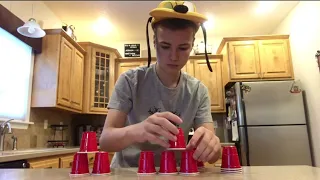 Cup Stacking While My Parents Fight About Their Divorce.