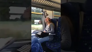 Girl sleeping mouth open train