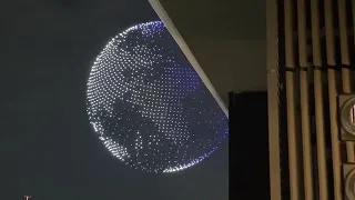 1800 drones form a globe above the National Stadium at the Tokyo2020 Olympics opening ceremony