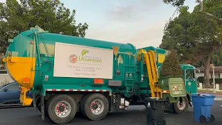 Garbage trucks packing out on heavy overloaded post Christmas garbage collection