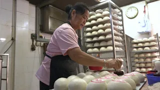 Hong Kong bakery amps up production ahead of Bun Festival | AFP