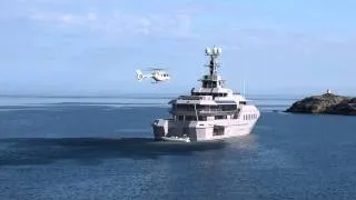Helicopter landing on Private yacht 'Skat' docked in Nusfjord.