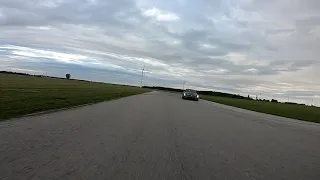 Cadillac ATS V drifts and chases Camaro 1LE on Road Course