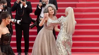 Andie MacDowell and Helen Mirren dancing on the red carpet in Cannes